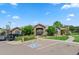Attractive clubhouse featuring stone accents, well-manicured landscaping, and convenient parking at 7440 S Blackhawk St # 104, Englewood, CO 80112