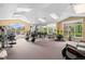 Well-equipped gym featuring modern exercise machines and equipment for a complete workout at 7440 S Blackhawk St # 104, Englewood, CO 80112