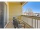 Cozy outdoor balcony with seating, perfect for enjoying the view at 9557 Pearl Cir # 204, Parker, CO 80134