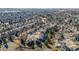 Expansive aerial shot of a densely populated neighborhood with various home styles and landscaping at 758 Poppywood Pl, Highlands Ranch, CO 80126