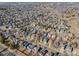 A broad aerial perspective of a residential community featuring an array of houses and well-planned streets at 758 Poppywood Pl, Highlands Ranch, CO 80126