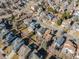 Birds eye view of a neatly organized suburban area, highlighting diverse architectural designs and mature trees at 758 Poppywood Pl, Highlands Ranch, CO 80126