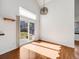 Bright dining area featuring hardwood floors and sliding glass doors leading to the backyard at 758 Poppywood Pl, Highlands Ranch, CO 80126