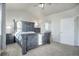 Spacious main bedroom with a large bed, neutral tones, and a serene ambiance at 25525 E 1St Ave, Aurora, CO 80018