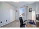 Bright home office space with a large window, neutral carpet and ample natural light at 25525 E 1St Ave, Aurora, CO 80018