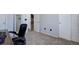 Office space with neutral carpeting and a view of a mirror and the home's hallway at 25525 E 1St Ave, Aurora, CO 80018