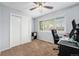 Bedroom boasts ample natural light, closet with mirrored doors, and neutral carpeting at 8873 Yukon St, Broomfield, CO 80021