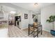 Kitchen features a breakfast nook, black appliances, tile flooring and a skylight for natural light at 8873 Yukon St, Broomfield, CO 80021
