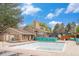 Outdoor pool with tanning deck and seating. The pool is currently empty at 8873 Yukon St, Broomfield, CO 80021