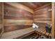 Relaxing home sauna with wooden benches and paneling, offering a spa-like experience at 8873 Yukon St, Broomfield, CO 80021