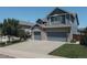 Charming two-story home with brick accents and a spacious three-car garage at 10144 Madison St, Thornton, CO 80229