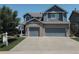 Charming two-story home with brick accents and a spacious three-car garage at 10144 Madison St, Thornton, CO 80229