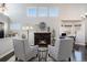 Bright and airy living room with fireplace and lots of natural light at 10144 Madison St, Thornton, CO 80229
