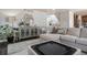 Comfortable living room with stylish furnishings and modern accents at 10144 Madison St, Thornton, CO 80229