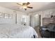 Bright main bedroom features neutral walls and carpet and an attached sitting area at 10144 Madison St, Thornton, CO 80229