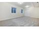 Bedroom featuring neutral tones and natural light from an egress window at 787 Kendall Ct, Lakewood, CO 80214