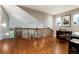 Bright loft area featuring hardwood floors, tall ceilings and a view to the lower level at 787 Kendall Ct, Lakewood, CO 80214