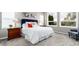 Inviting main bedroom with bright windows and carpet flooring at 787 Kendall Ct, Lakewood, CO 80214