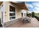 Expansive outdoor deck includes awning, seating, and space for entertaining at 787 Kendall Ct, Lakewood, CO 80214