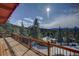 Deck overlooking mountain landscape at 4969 S Indian Trl, Evergreen, CO 80439