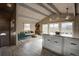 Modern kitchen with island and wood accents at 4969 S Indian Trl, Evergreen, CO 80439