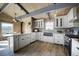 Updated kitchen with farmhouse sink at 4969 S Indian Trl, Evergreen, CO 80439