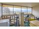 Enclosed balcony area with large windows, brick railings, and plenty of space at 625 S Alton Way # 3D, Denver, CO 80247