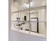 The Kitchen, featuring white appliances at 625 S Alton Way # 3D, Denver, CO 80247