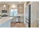 Stylish kitchen featuring stainless steel appliances and a large island, perfect for entertaining at 3963 N Quatar Ct, Aurora, CO 80019