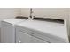 This well-equipped laundry room features a modern washer and dryer for efficient laundry care at 3963 N Quatar Ct, Aurora, CO 80019
