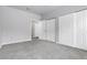 Spacious bedroom with ample closet space and neutral carpeting at 8475 Pebble Creek Way # 204, Highlands Ranch, CO 80126