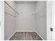 Walk-in closet with neutral carpeting, rod for hanging clothes, and a wire shelf for storage at 8475 Pebble Creek Way # 204, Highlands Ranch, CO 80126