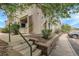 Apartment building with a stairway, a tree, and a car in the parking lot at 8475 Pebble Creek Way # 204, Highlands Ranch, CO 80126