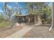 Gated community pool area with an outdoor grill and seating at 8475 Pebble Creek Way # 204, Highlands Ranch, CO 80126