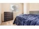 Cozy bedroom features a plush bed, large window, and closet for storing your wardrobe at 2111 W 80Th Ave, Denver, CO 80221