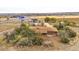 Aerial view of ranch house with mature trees and highway access at 1941 W 160Th Ave, Broomfield, CO 80023