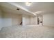 Large finished basement, ideal for recreational activities or additional living space at 14735 W Ellsworth Ave, Golden, CO 80401