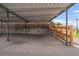 Covered carport area offering protection for vehicles from the elements at 14735 W Ellsworth Ave, Golden, CO 80401