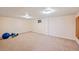 Spacious basement featuring carpet floors and ample room for activities at 12154 W Exposition Dr, Lakewood, CO 80228