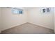 Bedroom featuring neutral carpet and natural light from windows at 12154 W Exposition Dr, Lakewood, CO 80228