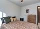 Bedroom with double bed and dresser, ample closet space at 3225 S Garrison St # 41, Lakewood, CO 80227