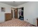 Bedroom with double bed, dresser, and closet at 3225 S Garrison St # 41, Lakewood, CO 80227