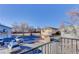 Another view from balcony showcasing the parking lot and buildings at 3225 S Garrison St # 41, Lakewood, CO 80227