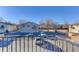 View from balcony showcases a parking lot and surrounding buildings at 3225 S Garrison St # 41, Lakewood, CO 80227