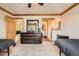 Bright bedroom with wood trim, a large dresser, and an en suite bathroom at 16463 E Girard Ave, Aurora, CO 80013