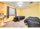 Bright bedroom with carpeting, a ceiling fan, and two twin beds at 16463 E Girard Ave, Aurora, CO 80013