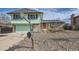 Two story home with basketball hoop, walkway to the front door, and drought-resistant landscaping at 16463 E Girard Ave, Aurora, CO 80013