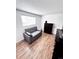 Bedroom with vinyl floors, sofa, and dresser at 357 Saturn Pl, Lone Tree, CO 80124