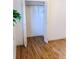 Bright closet featuring bifold doors, hanging rod, and wood-look flooring at 357 Saturn Pl, Lone Tree, CO 80124
