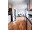 Functional kitchen with stainless steel refrigerator, modern table, and ample natural light at 357 Saturn Pl, Lone Tree, CO 80124